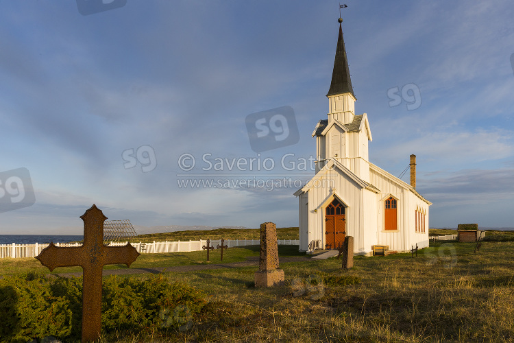 Nesseby Church, landscape with church and cemetery