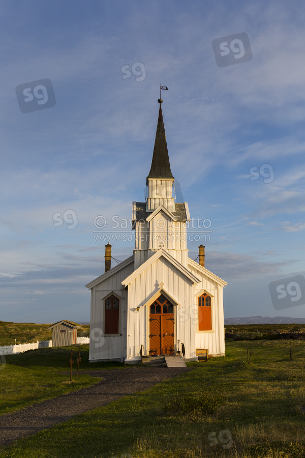 Nesseby Church, landscape with church and cemetery